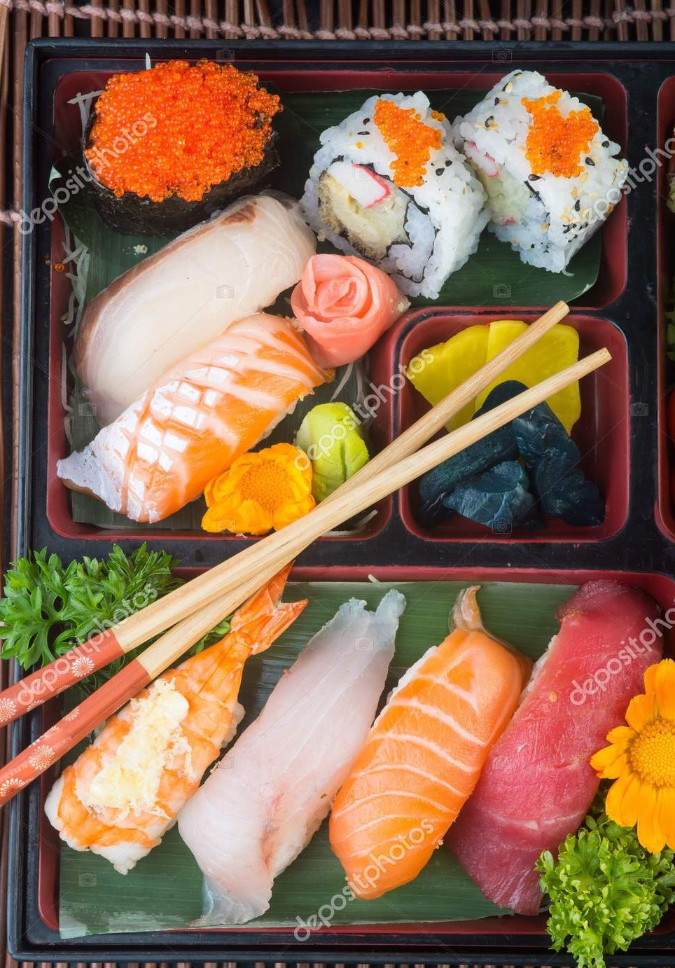 depositphotos_176863878-stock-photo-japanese-cuisine-sushi-set-on-e1562997609531.jpg